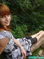Smily beautiful redhead teen taking off - Picture 14