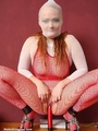 Shaved pussy stunner in red fishnet - Picture 14