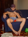 An orange dildo is going to and through - Picture 5