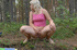Blonde peeing in the forest.